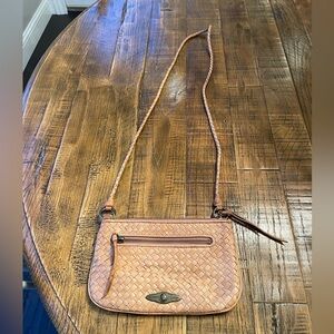 Elliott Lucca braided tan leather crossbody.